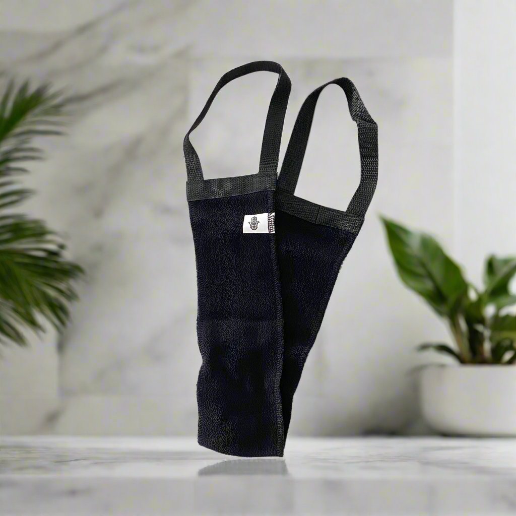 Full shot of a back loofah designed for deep cleansing, featuring soft, exfoliating natural fibers, ideal for reaching and scrubbing the back effortlessly. Perfect for luxurious Moroccan hammam rituals.