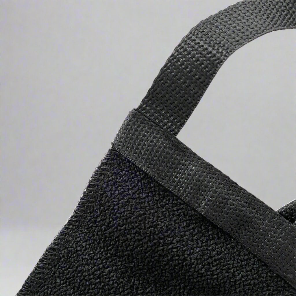 Close-up of a back loofah designed for deep cleansing, featuring soft, exfoliating natural fibers, ideal for reaching and scrubbing the back effortlessly. Perfect for luxurious Moroccan hammam rituals.