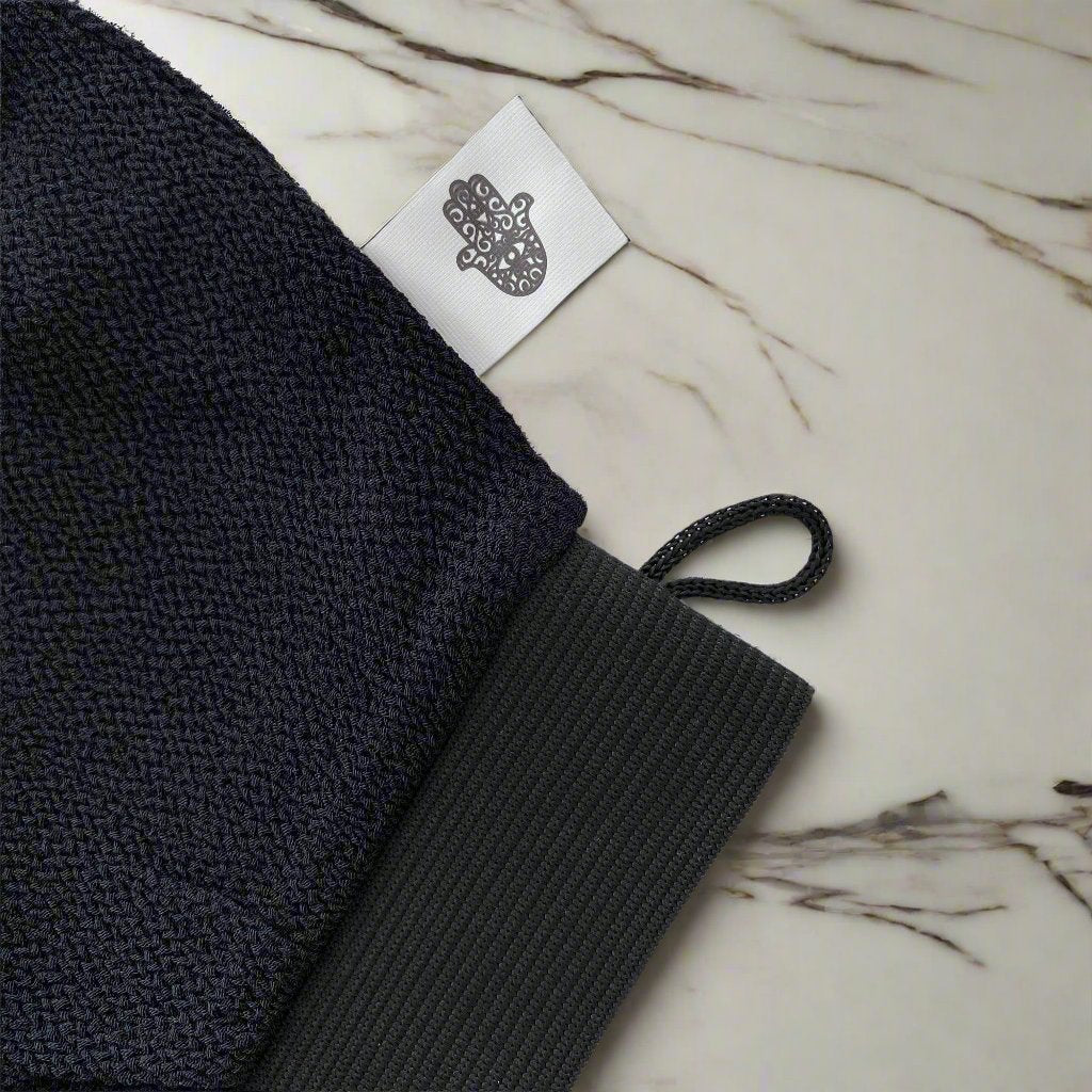 Close-up image of a Kees glove, showcasing its durable stitching, flexible design, and textured grip surface, perfect for comfortable and effective hand protection during various tasks.