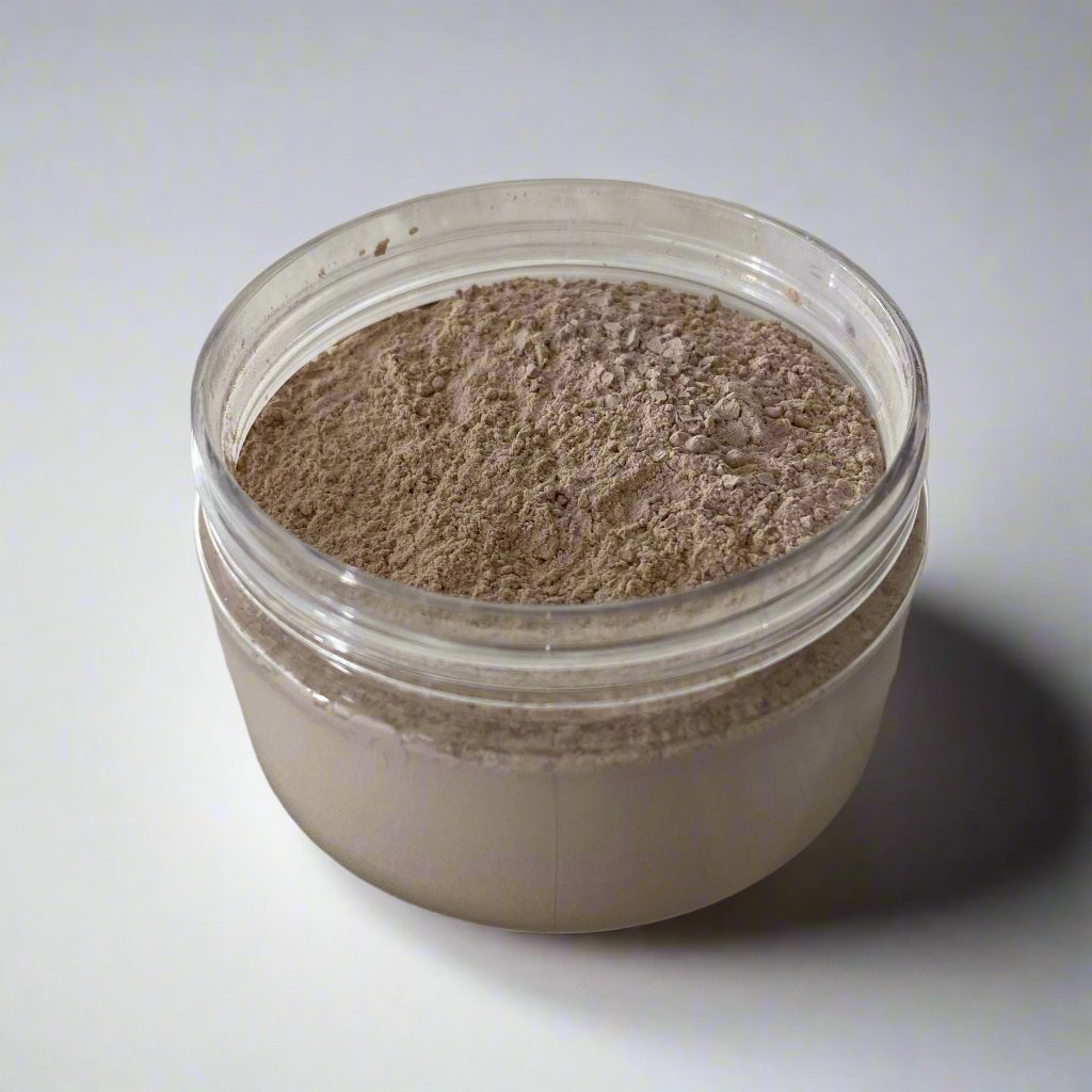 Beldies Rhassoul clay jar opened, revealing the fine, soft powder that can be mixed with water for a purifying and rejuvenating face or body mask.