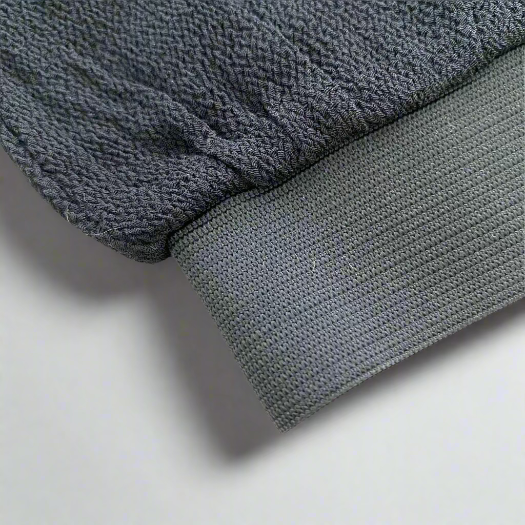 Image of a Kees glove, showcasing its durable stitching, flexible design, and textured grip surface, perfect for comfortable and effective hand protection during various tasks.