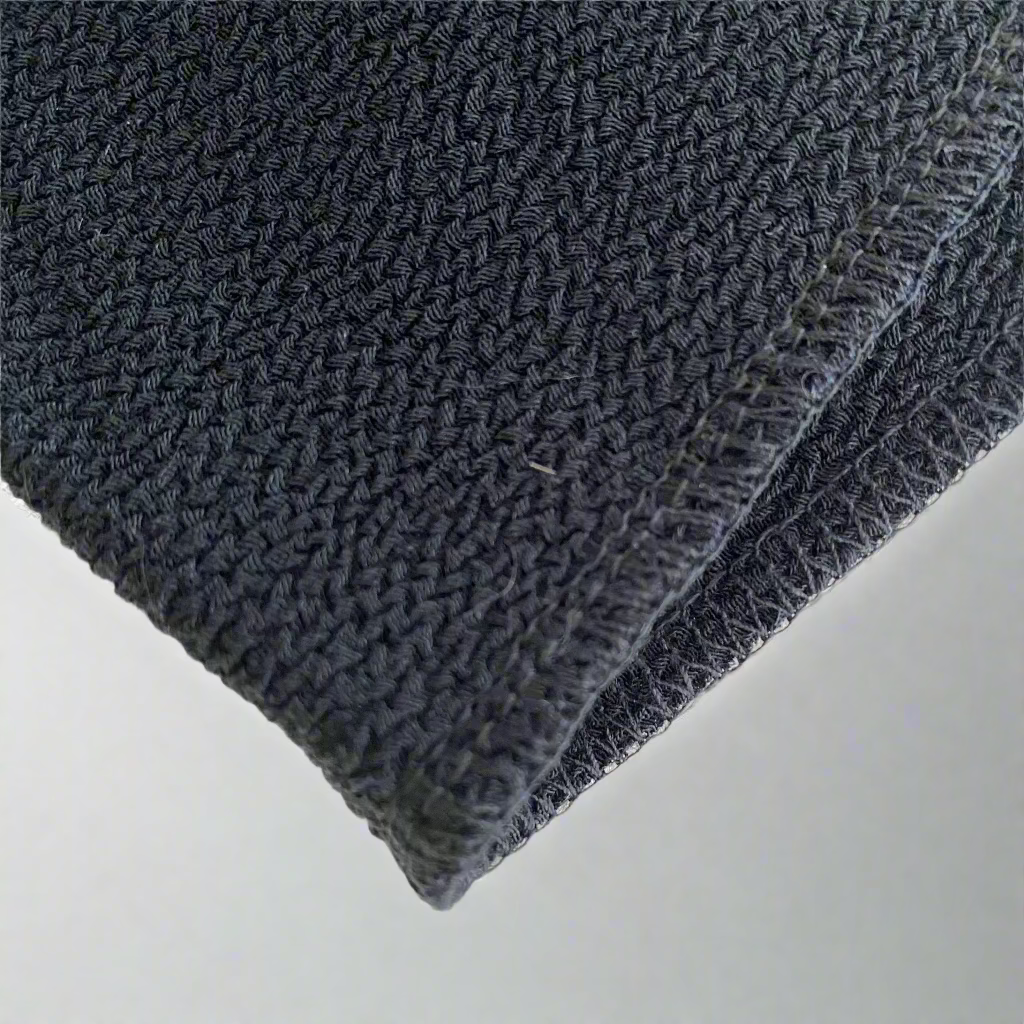 Close-up of a back loofah designed for deep cleansing, featuring soft, exfoliating natural fibers, ideal for reaching and scrubbing the back effortlessly. Perfect for luxurious Moroccan hammam rituals.