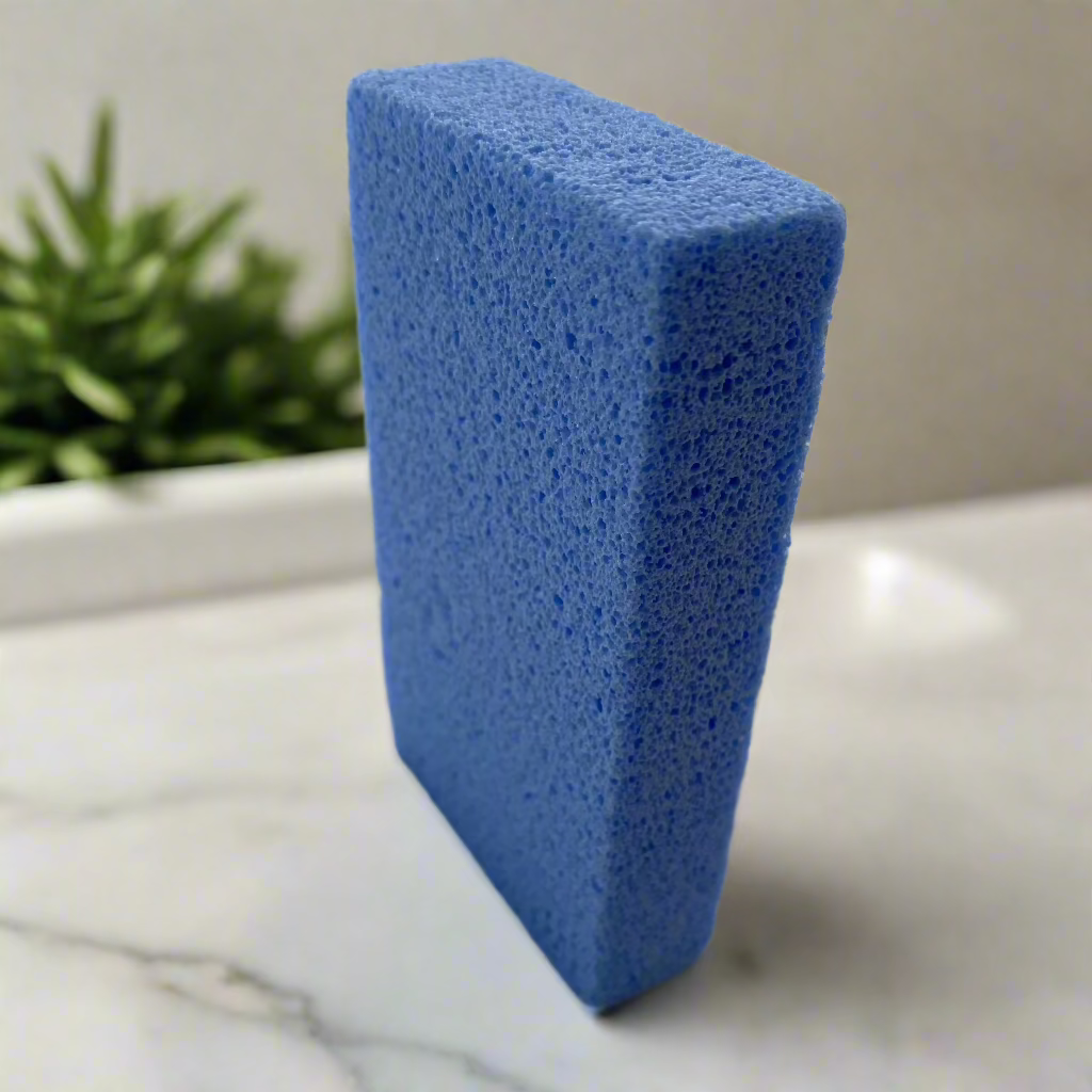 Close-up image of a Beldies pumice stone, showcasing its natural texture and ergonomic shape, designed for effective exfoliation and smooth skin care.